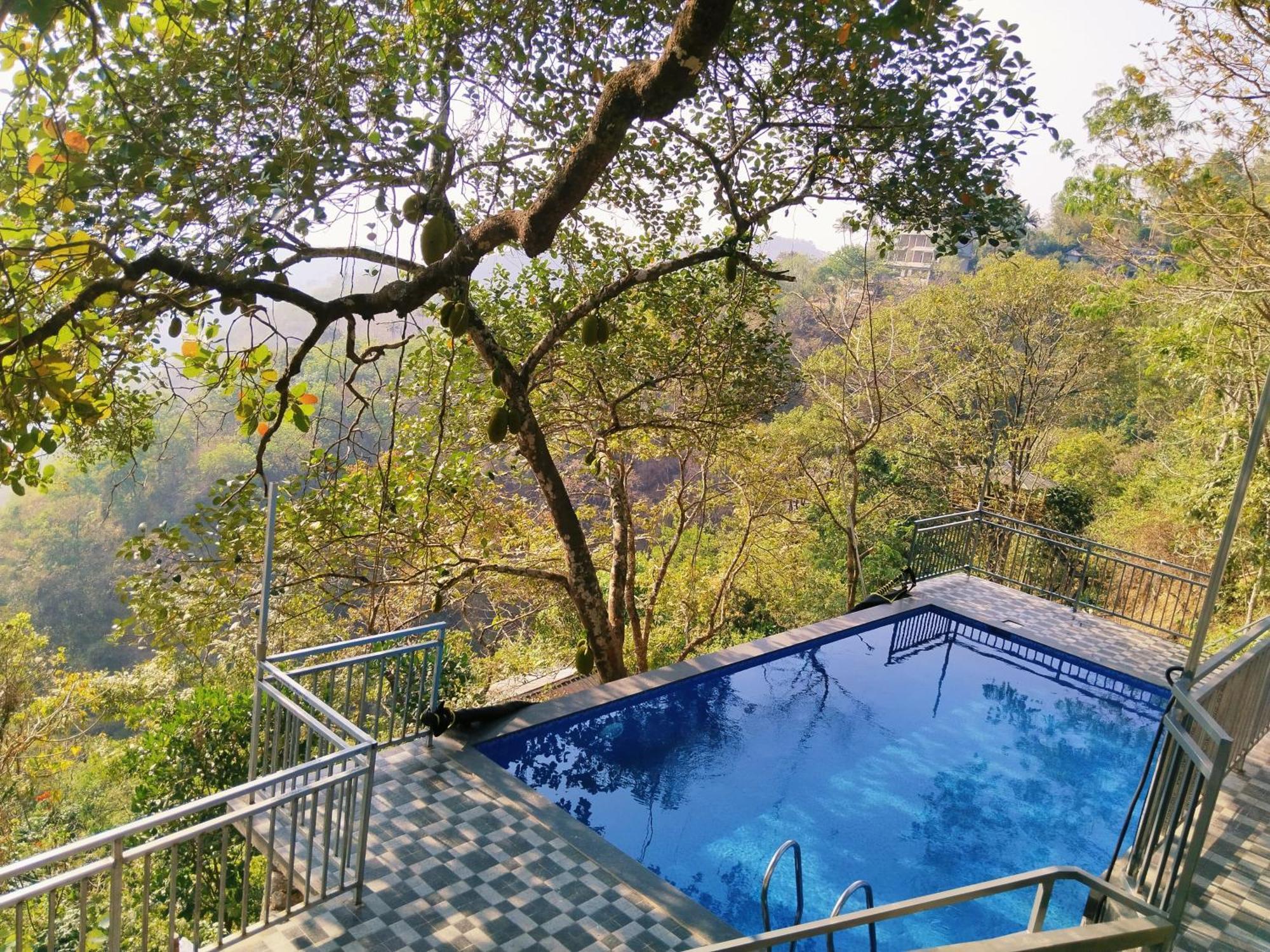 Sunset Valley Kerala Pool Resort - Serene Natural Forest Cottage Stay In Idukki With Sunrise & Sunset Panoramas, Natural Streams & Tranquil Summer Evenings Pīrmed Eksteriør billede